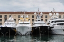 Yachts on the Molo Vecchio Dock. Porto Antico during the Genoa Charter Show