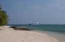 A view of Island Explorer from the beach on Oluhali a desserted Island
