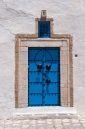 Traditional blue painted wooden door in Sidi Bou Said