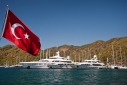 Superyachts in the Mega Yacht Dock in Gocek with a Turkish ensign