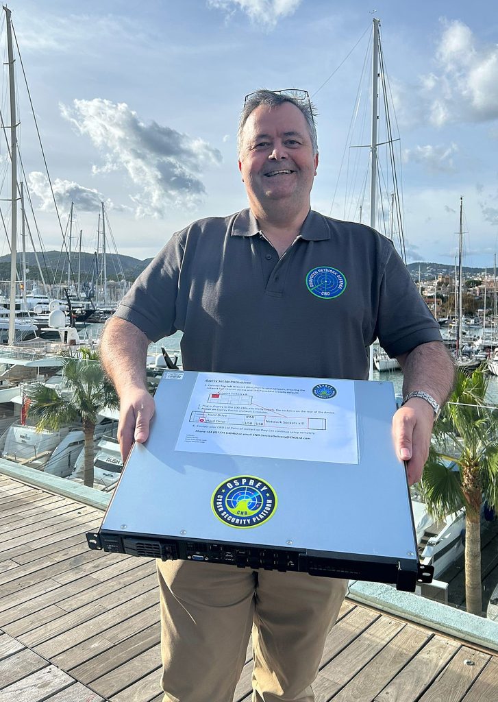 Andy Cuff from CND with its 'box of tricks' that keeps superyachts safe from cyber attacks